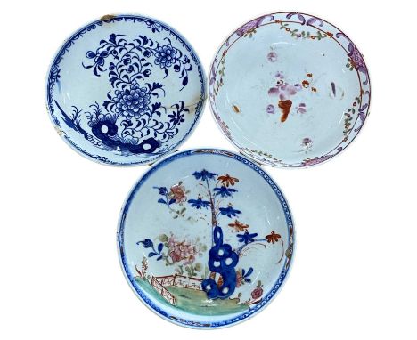 Three Lowestoft porcelain saucers, one Redgrave type with polychrome design of bamboo and flowers, a blue and white example a