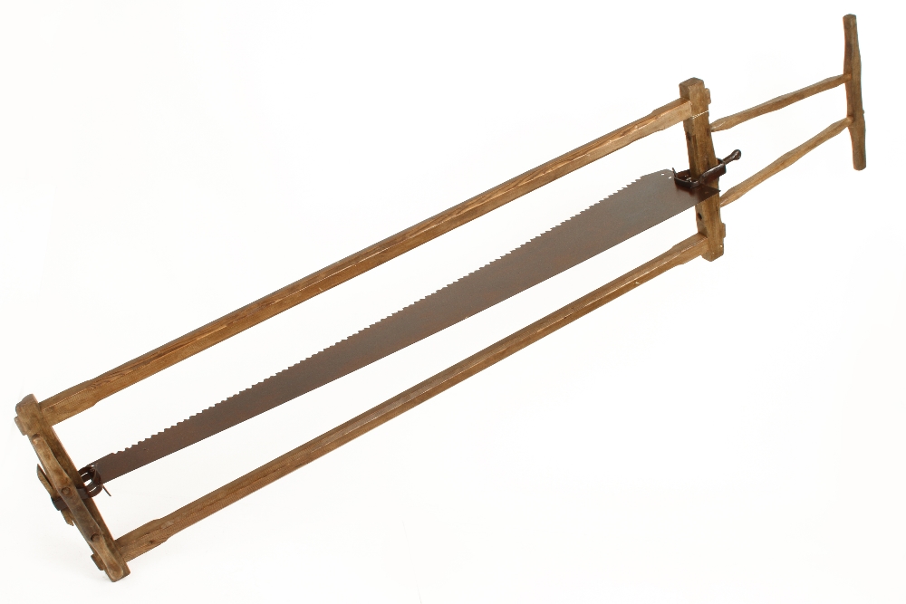 A broad blade pit saw with chamfered pine frame with oak handles 7' 9