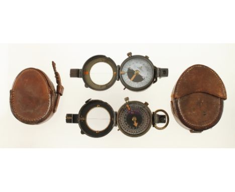 A prismatic compass by J.H.STEWARD  and another both in orig leather cases (Jay Gaynor collection) G