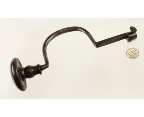 An early smith's iron brace by FARROW & JACKSON with 4" sweep G+