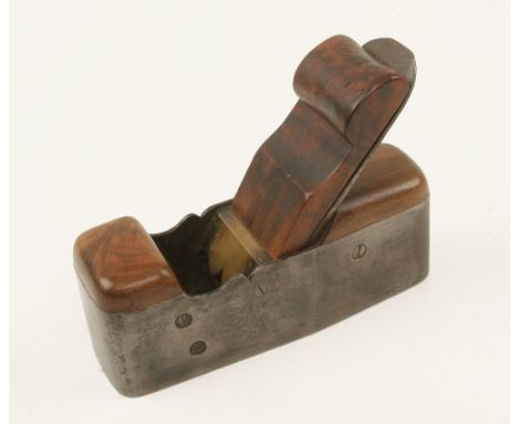 An iron smoother with cupids bow shaped sides and brass lever with walnut infill and wedge G+