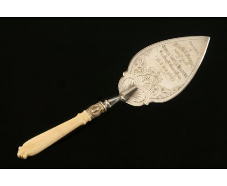 An unusual French silver plated presentation trowel with "offerte a Melle. M.U.Mauger par le Comitede la Nouvelle Chapelle We