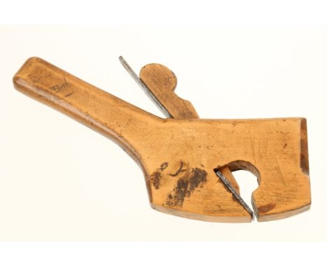 A miniature boxwood tailed compass rebate plane, the sole 2 1/4" x 1/2" (Russell collection)