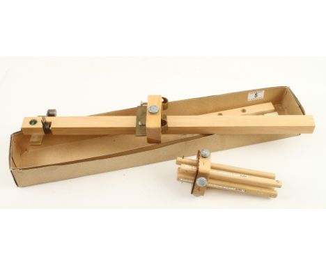 An unused panel gauge in orig box and an unused four stem combination gauge both by ULMIA N