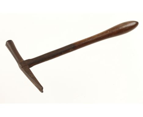 An upholsterers strapped hammer with line decoration to head G