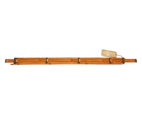 A HAMS Ullage Rule c1850, a complex 42" boxwood slide and dipping rule, the boxwood stock with brass fittings including hinge