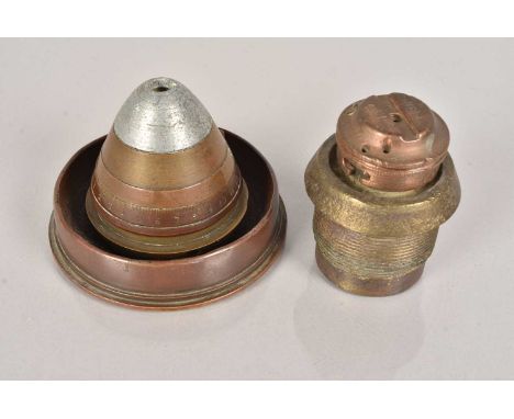 A WWI Timer Fuse Trench Art, the timer fuse being attached to an 18 Pound base, together with another fuse (2)