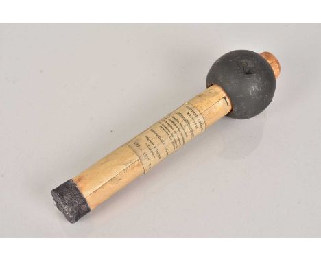 An inert WWI Austro-Hungarian Rohr Ball Stick Grenade, having reproduction handle and label