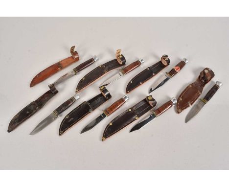 A selection of seven small pocket hunting knives, all of similar designs and with scabbards, makers include Wright & Sons, Wi