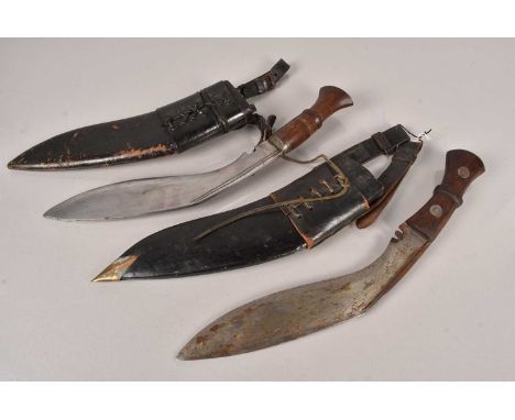 A Military Issue Indian Kukri knife, having stamped blade, complete with 1946 dated scabbard by C.T.Ltd, together with anothe