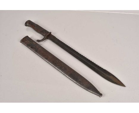 A German Sawback Bayonet by Simson & Co, dated 16 to the spine, complete with scabbard, no postage for this lot, we can suppl