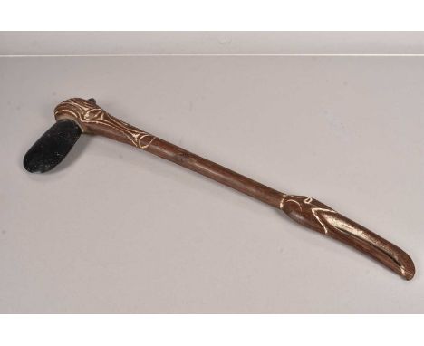 An African Tribal Axe, having large flint style head, on carved shaft, 55cm