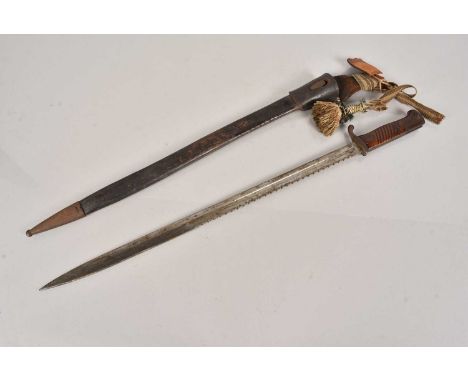 A German S98 Sawback bayonet, by Haenel, dated 07 to the spine of the blade, complete with scabbard, leather frog and knot, n