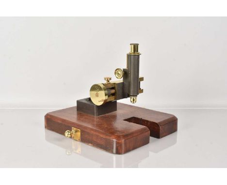 An Unusual Micrometer Measuring Microscope, c.1912, the monocular body, with single 1 in 22mm objective by Beck, with single 