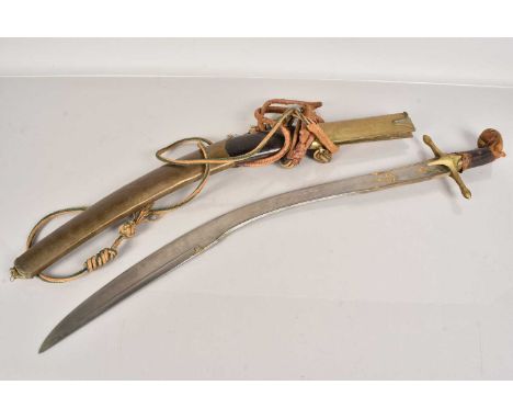 A Persian Shamshir, having gilt decorated 72cm long curved blade, with brass cross guard, horn grip, with central brass band,