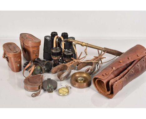 An collection of various items, to include a pair of leather gators, an Army & Navy hook, a pocket watch, a pair of spurs, a 