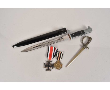 An Etched Eickhorn Style Dress Bayonet, complete with scabbard, together with a German Letter opener, an Iron Cross and a Mer