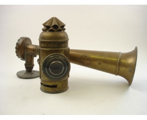 A Victorian brass hand held 'Boat -Signal lantern' with clear bull's eye lens, together with a Tyfon patent foghorn :, number