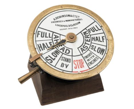 A brass engine room telegraph by A Robinson & Co Ltd, Liverpool & Glasgow:, the white enamel dial signed as per title with bl