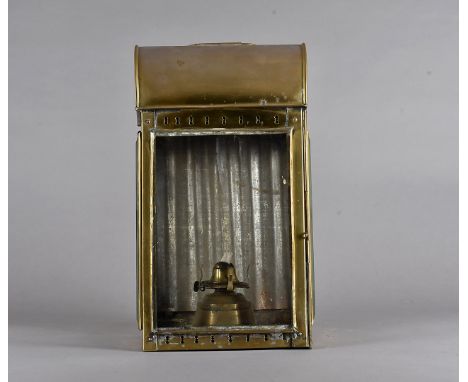 A 19th Century brass and glazed platform lamp, of rectangular shape having domed diffuser to top and swing handle, 47 cm x 21