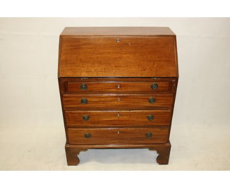 An Edwardian mahogany bureau, having fall front over four graduated long drawers on bracket feet, 75 cm x 95 cm x 41 cm deep