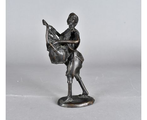 An African bronze figure, modelled as a male possibly carrying a musical instrument, unmarked, 22cm H