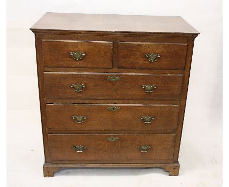 A 19th Century oak chest of drawers, two short over three long drawers, bracket feet, brass handles, 98 cm wide x 105 cm high