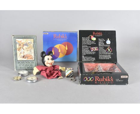 A Rubiks Magic Puzzle, in original box, together with a Rubiks clock puzzle in original box, a miniature Rubiks key fob, a Mi