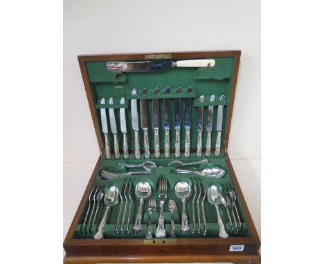 A six setting silver plated set of cutlery in an associated canteen - missing two small forks, a dessert spoon and a carving 