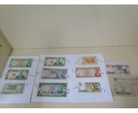 A collection of 18 World Bank notes and four Dads Army notes including a circa 19th century Wisbech and Lincolnshire bank £5 