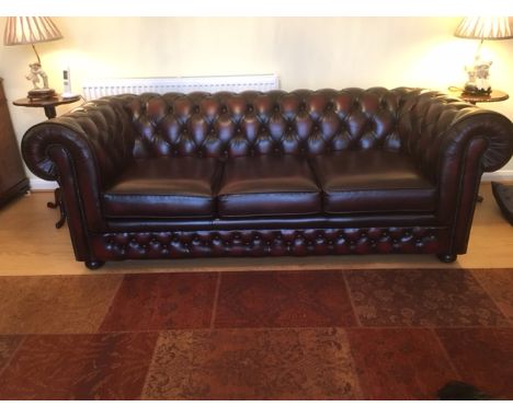 A Thomas Lloyd leather Chesterfield settee sofa bed - as new, only a few months old