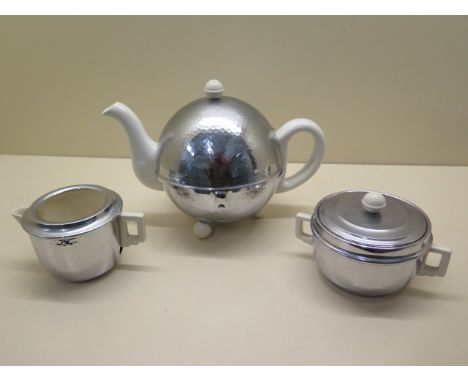 A vintage Heatmaster three piece tea set with globe teapot - reasonably good apart from chips to inside rim of teapot 