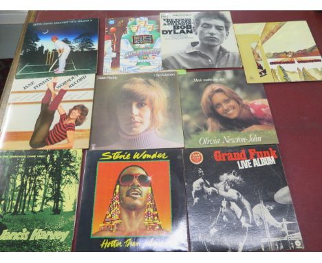 A collection of eleven LP records to include Jancis Harvey signed , From the Darkness Came Light - Helen Reddy, I am Woman an