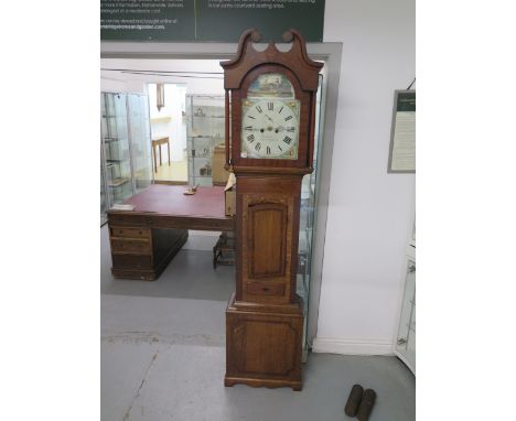 A 19th century mahogany and oak 8 day striking longcase clock signed R Tennison Chesterfield with a painted 13 inch arched di