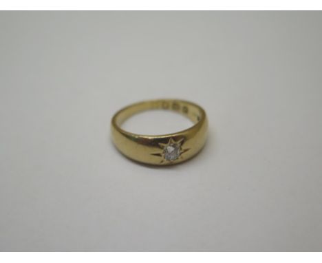 A hallmarked 18ct yellow gold diamond solitaire ring size K - approx weight 4.9 grams - some wear but generally good 