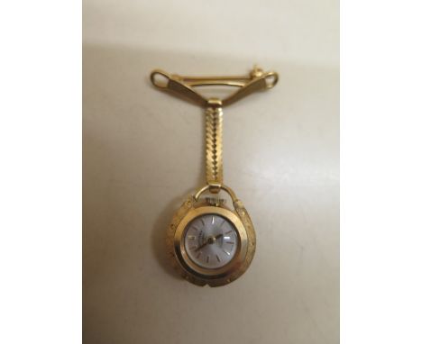 A 9ct yellow gold Rotary manual wind nurses lapel watch - case 2cm wide, weight without movement approx 6 grams - running, ge