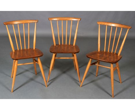 A set of three Ercol rail back single chairs