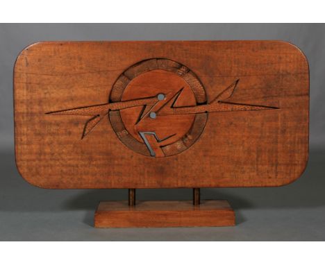 Basso Rilievo sculpture in wood, c.1970s, the panel hatched, cut and inset with a split arrow within a circle of plain and go