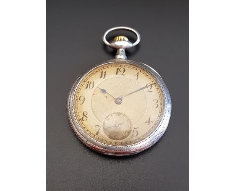 CONTINENTAL SILVER CASED POCKET WATCHthe gilt dial with Arabic numerals, subsidiary seconds dial and central engine turned de