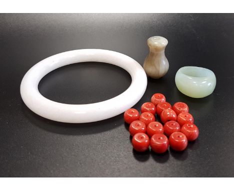 MIXED LOT OF JEWELLERYincluding a pale jade ring, jade finial, pale white jade like bangle and fifteen unstrung coral beads 