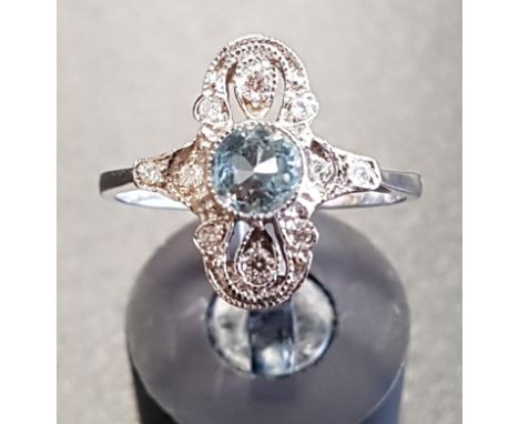 ART DECO STYLE AQUAMARINE AND DIAMOND PLAQUE RINGthe central round cut aquamarine in multi diamond pierced surround, in nine 