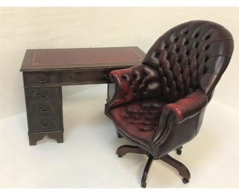 MAHOGANY PEDESTAL DESKwith an inset red leather top above an arrangement of eight drawers, standing on bracket feet, 122cm wi