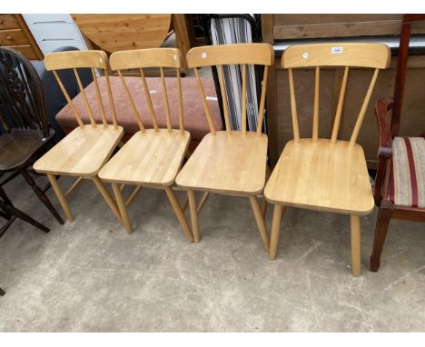 A SET OF FOUR ERCOL STYLE LIGHTWOOD DINING CHAIRS