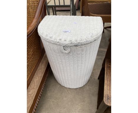 A LLOYD LOOM LINEN BASKET