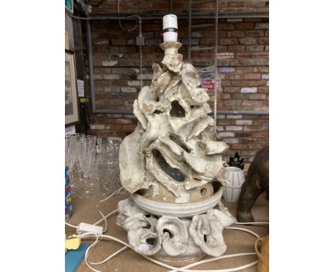 A LARGE POTTERY TABLE LAMP