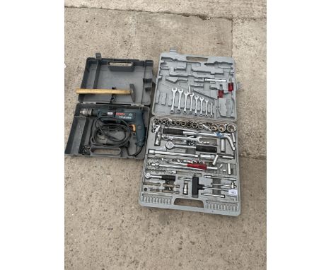 AN ASSORTMENT OF TOOLS TO INCLUDE A SOCKET SET AND A BOSCH DRILL