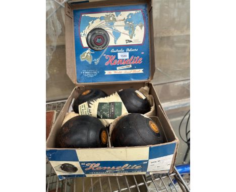 A SET OF FOUR VINTAGE BOXED HEMSLITE SUPER GRIP CROWN GREEN BOWLING WOODS