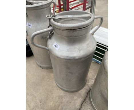 A SMALL ALUMINIUM MILK CHURN WITH LID
