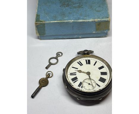 A HALLMARKED BIRMINGHAM SILVER POCKET WATCH WITH WHITE ENAMEL DIAL, SUB DIAL AND ROMAN NUMERALS WITH TWO KEYS AND A BOX SEEN 