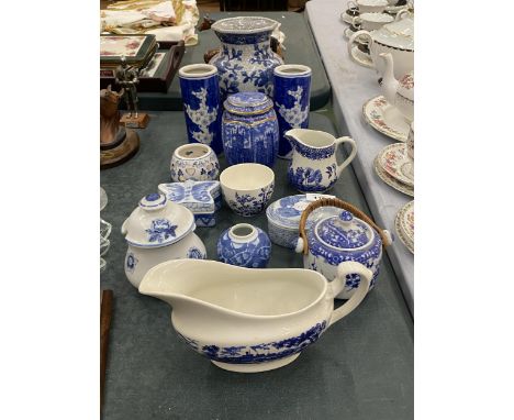 A QUANTITY OF BLUE AND WHITE CERAMICS TO INCLUDE A RINGTONS TEA CADDY, A PAIR OF FLORAL PRUNUS VASES, WILLOW BARRATTS CREAMER